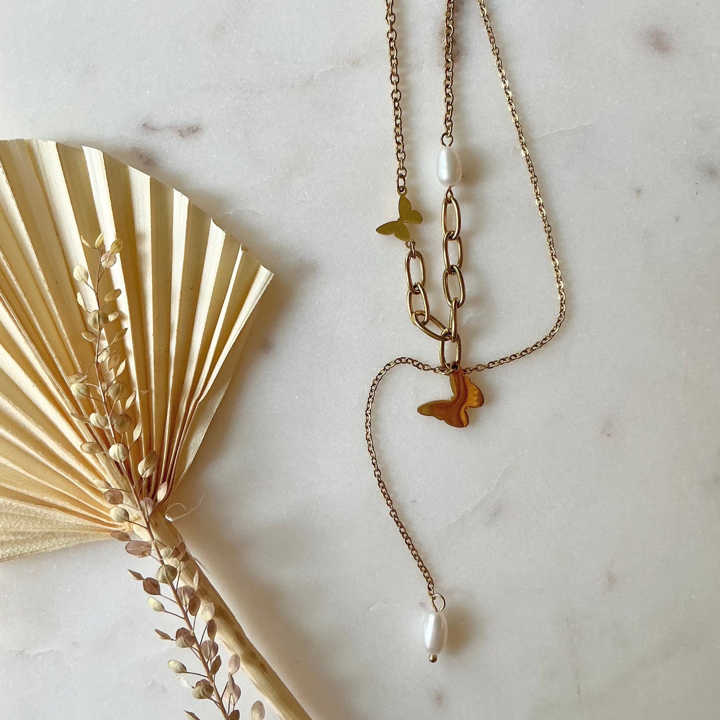 pearl butterfly charm necklace