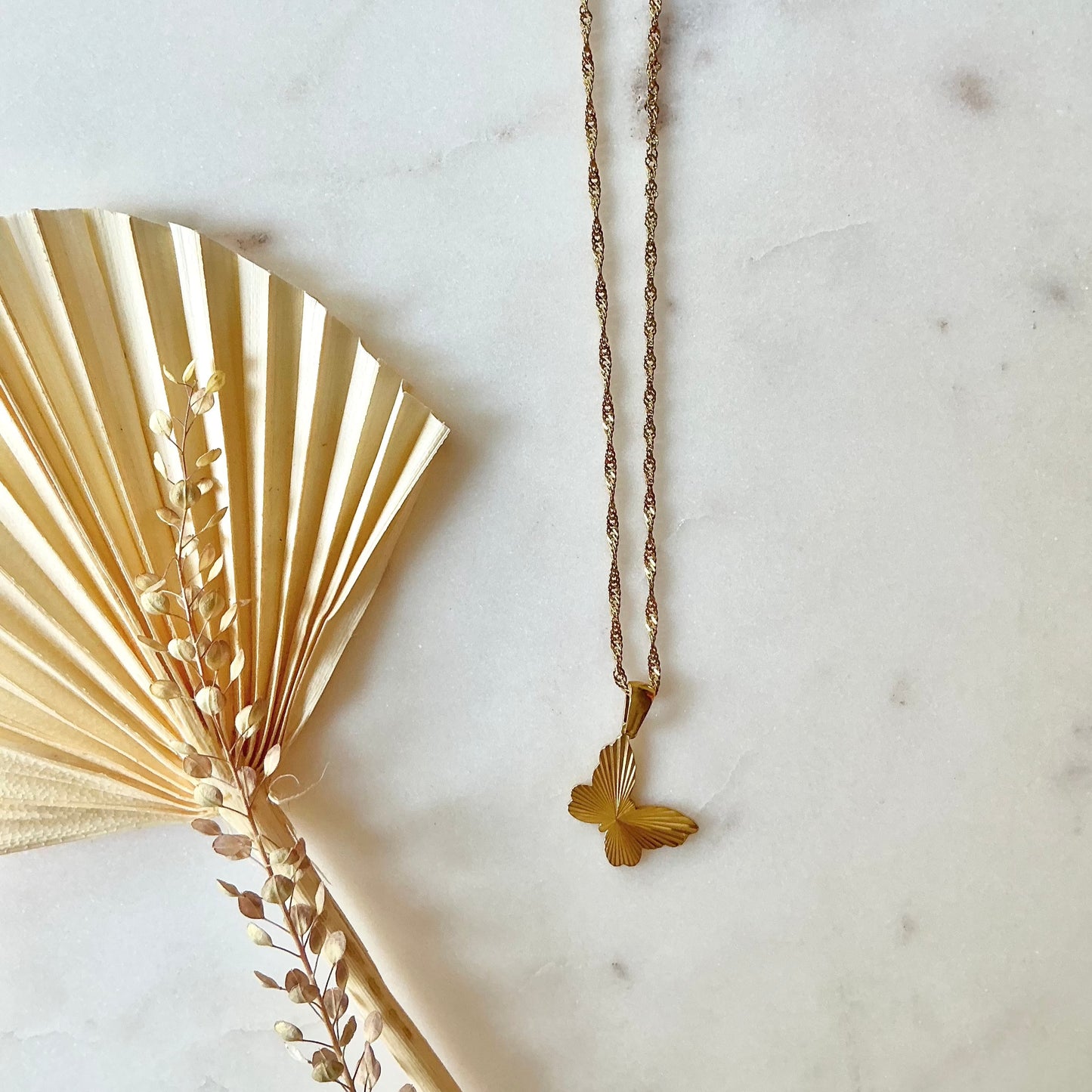 butterfly ray necklace