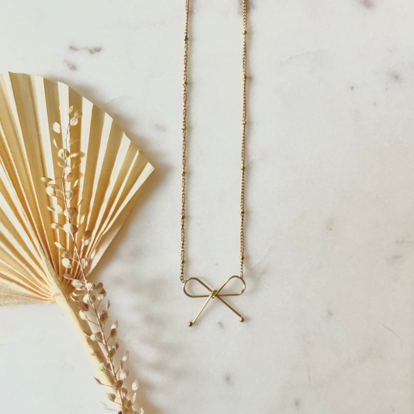 bow necklace